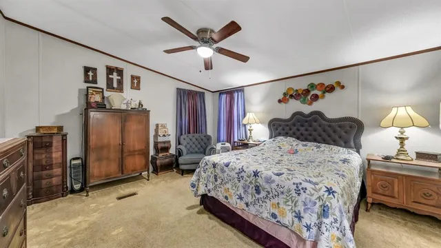 a bedroom with a bed and a walk in closet