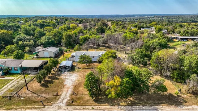 a view of residential houses with outdoor space