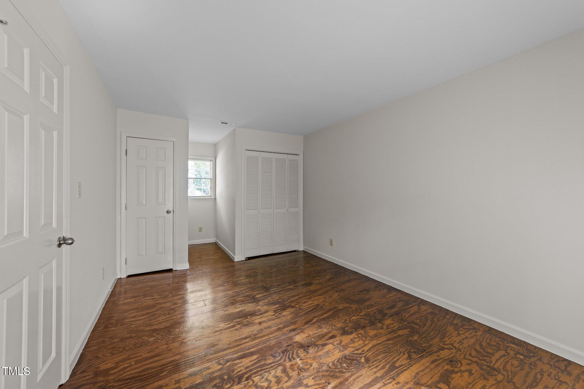 3309 Bearskin Court Raleigh, NC 27606 - Photo 17 of 40 Upstairs Bedroom 1