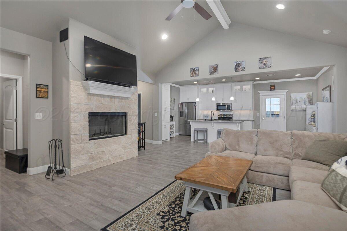 39 Cm Lane Canyon, TX 79015 - Photo 2 of 26 a living room with furniture and a flat screen tv