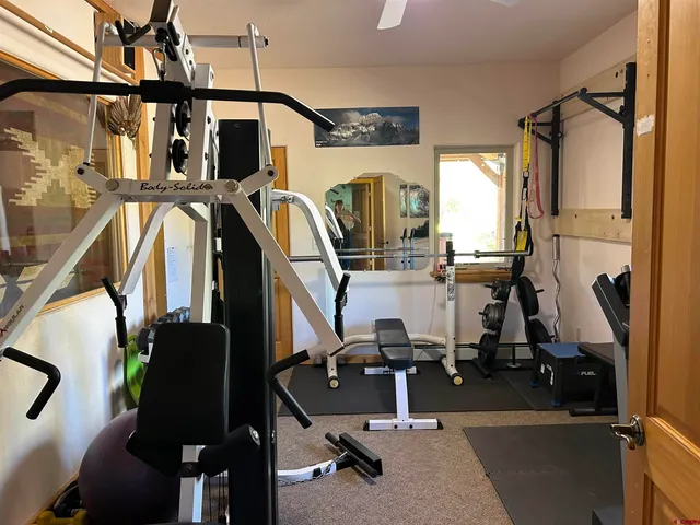 a view of a room with gym equipment