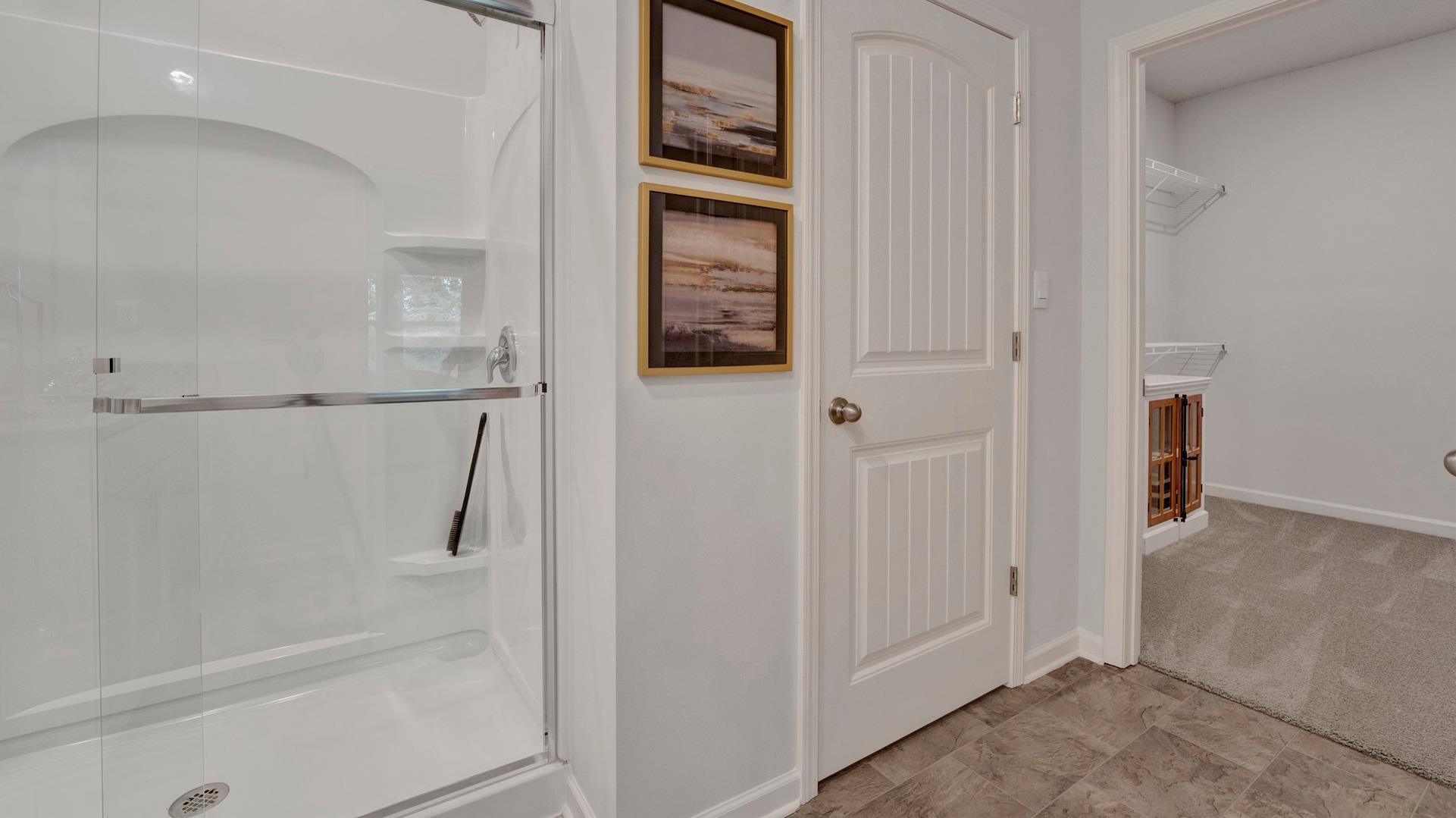 980 Mewborn Farm Road Oakland, TN 38060 - Photo 19 of 34 Bathroom featuring a stall shower and baseboards