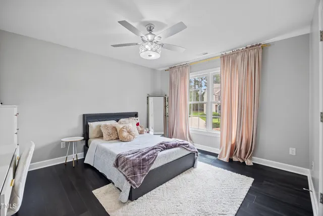a bathroom with a sink double vanity and a mirror