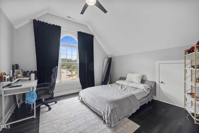 a spacious bathroom with a sink double vanity and a mirror