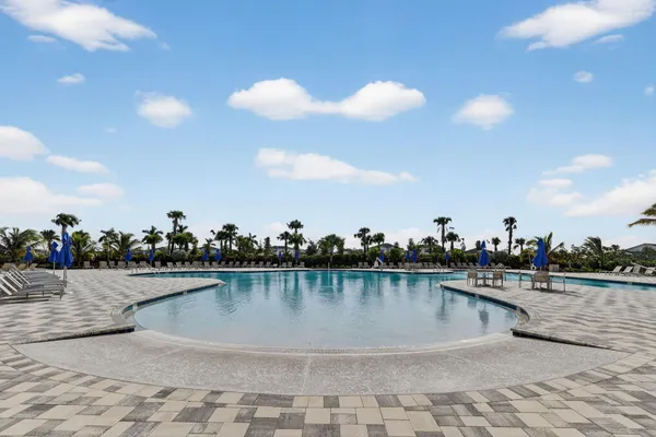 a view of a swimming pool from a balcony