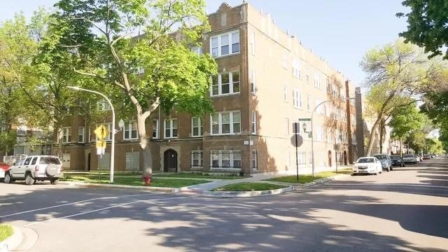 4304 West Shakespeare Avenue Chicago, IL 60639 - Photo 1 of 6 a view of a city street from a building