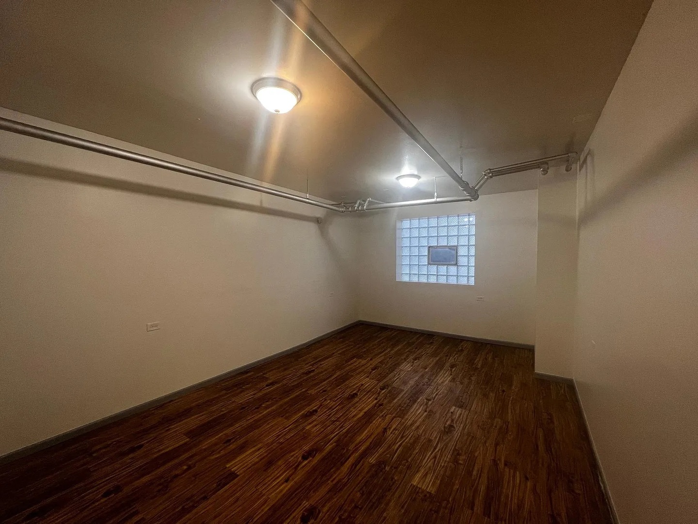 4304 West Shakespeare Avenue Chicago, IL 60639 - Photo 2 of 6 a view of an empty room and a window