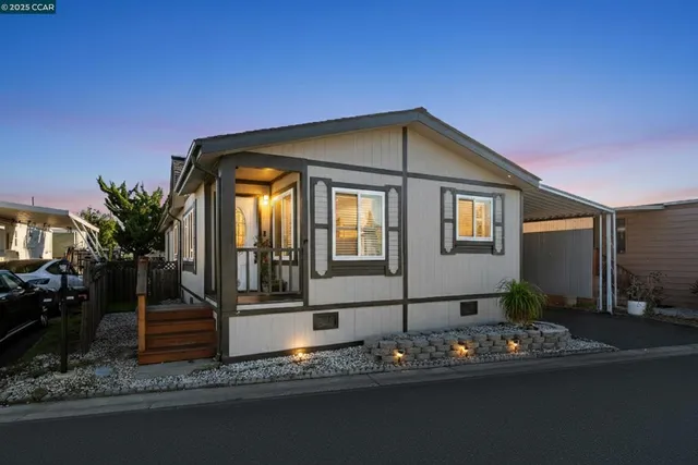 a front view of a house with yard