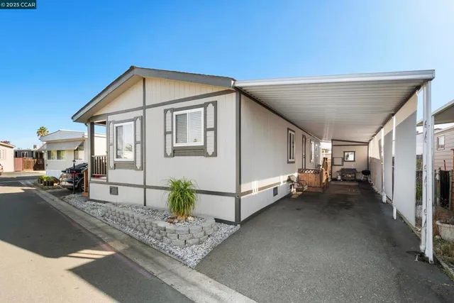 a view of a house with a street