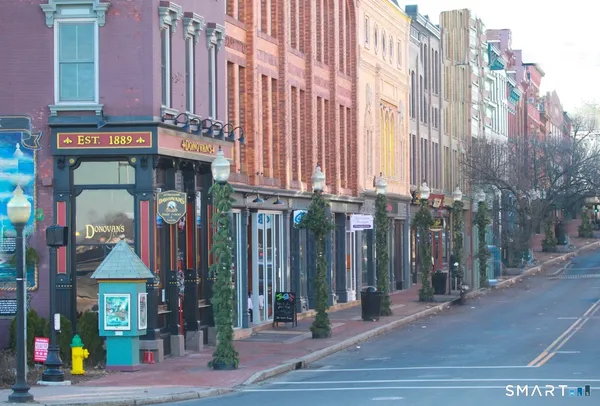 a view of a street with buildings