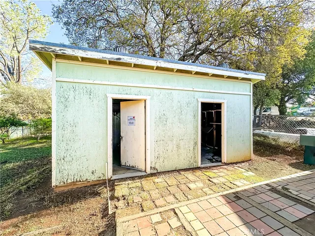 an aerial view of multiple house with yard