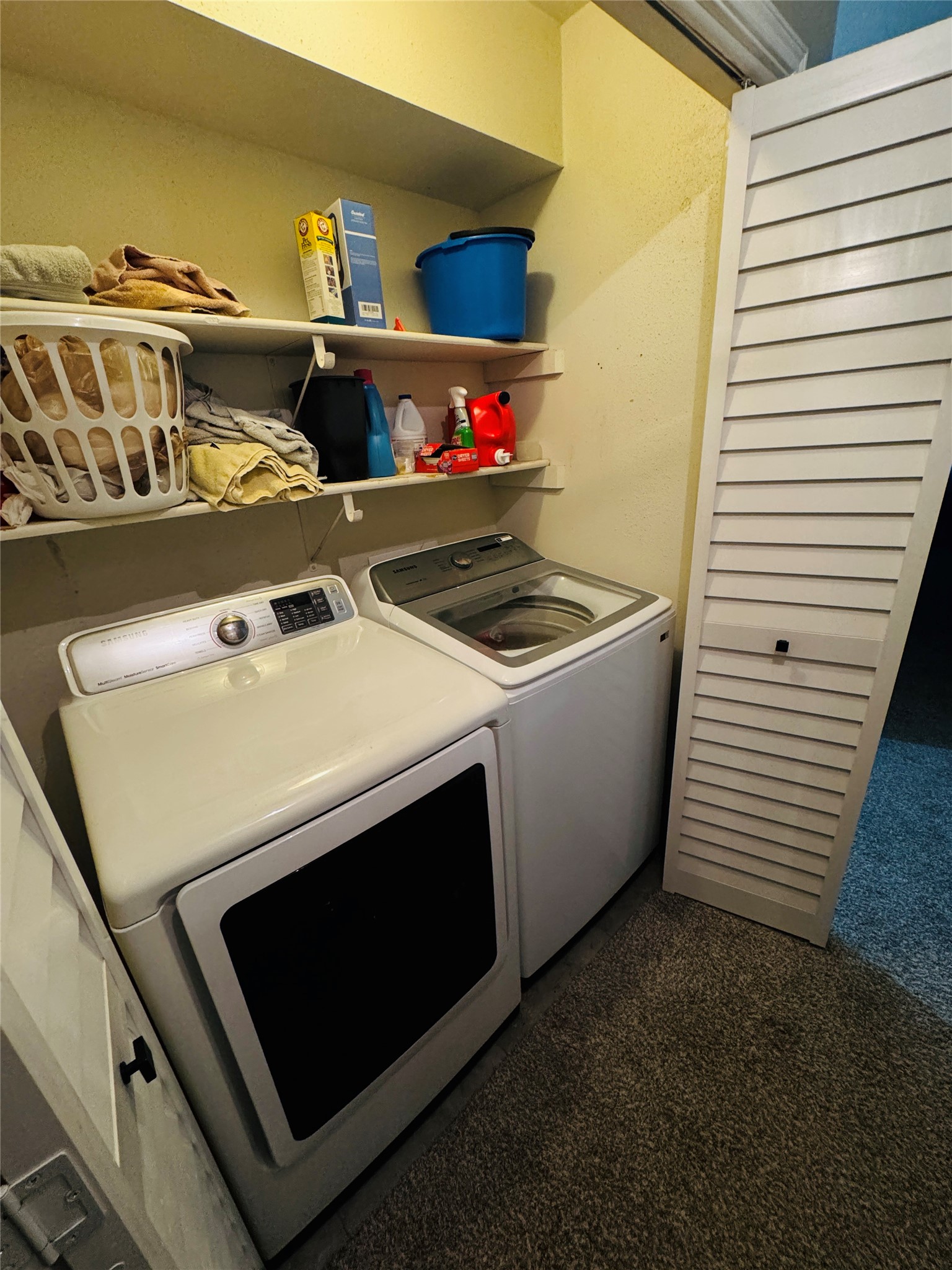 5800 Lumberdale Road, Unit 90 Houston, TX 77092 - Photo 34 of 39 The laundry area is on the second level.