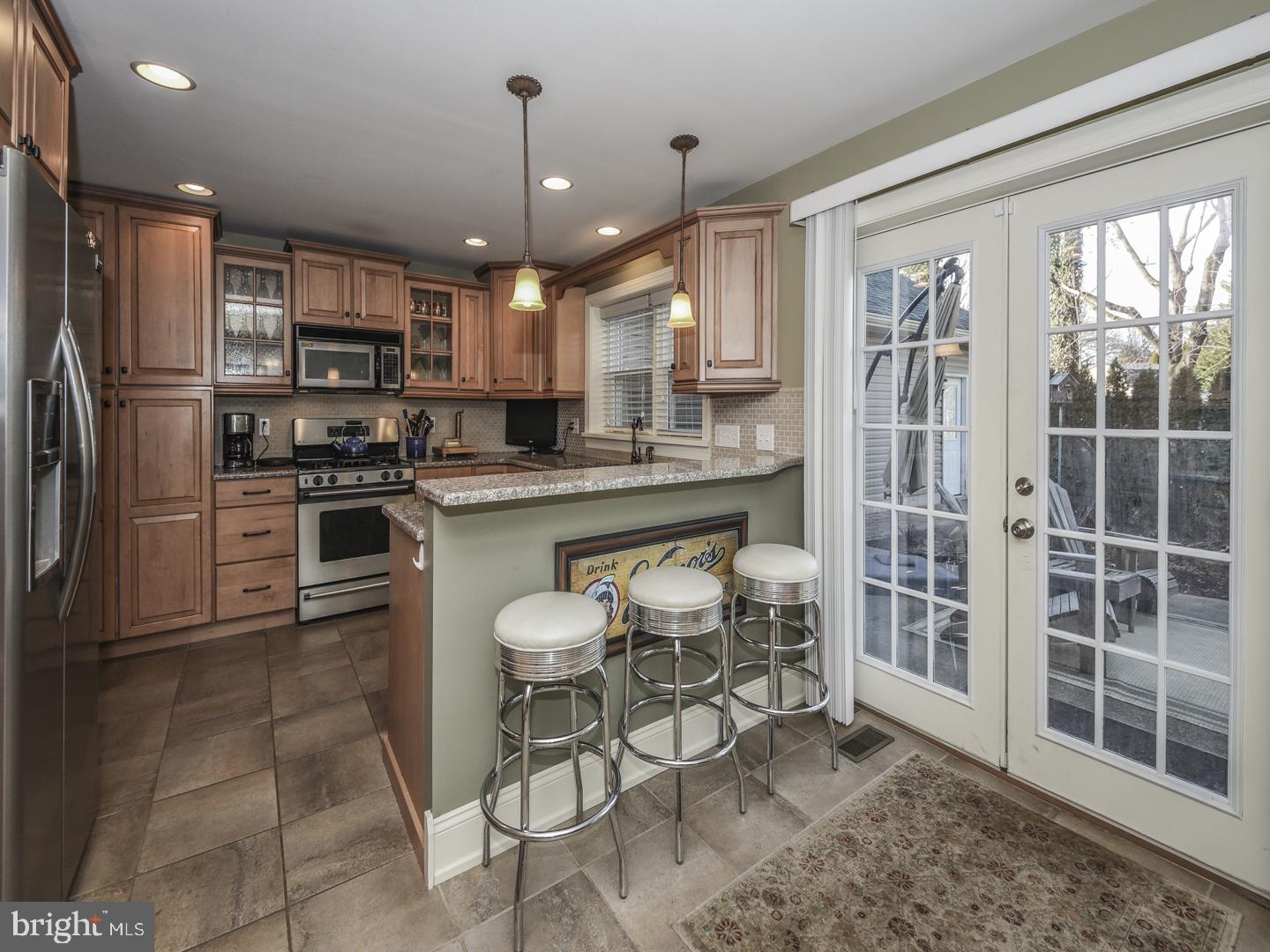 908 Edgewood Road Yardley, PA 19067 - Photo 16 of 39 Kitchen with access to rear patio