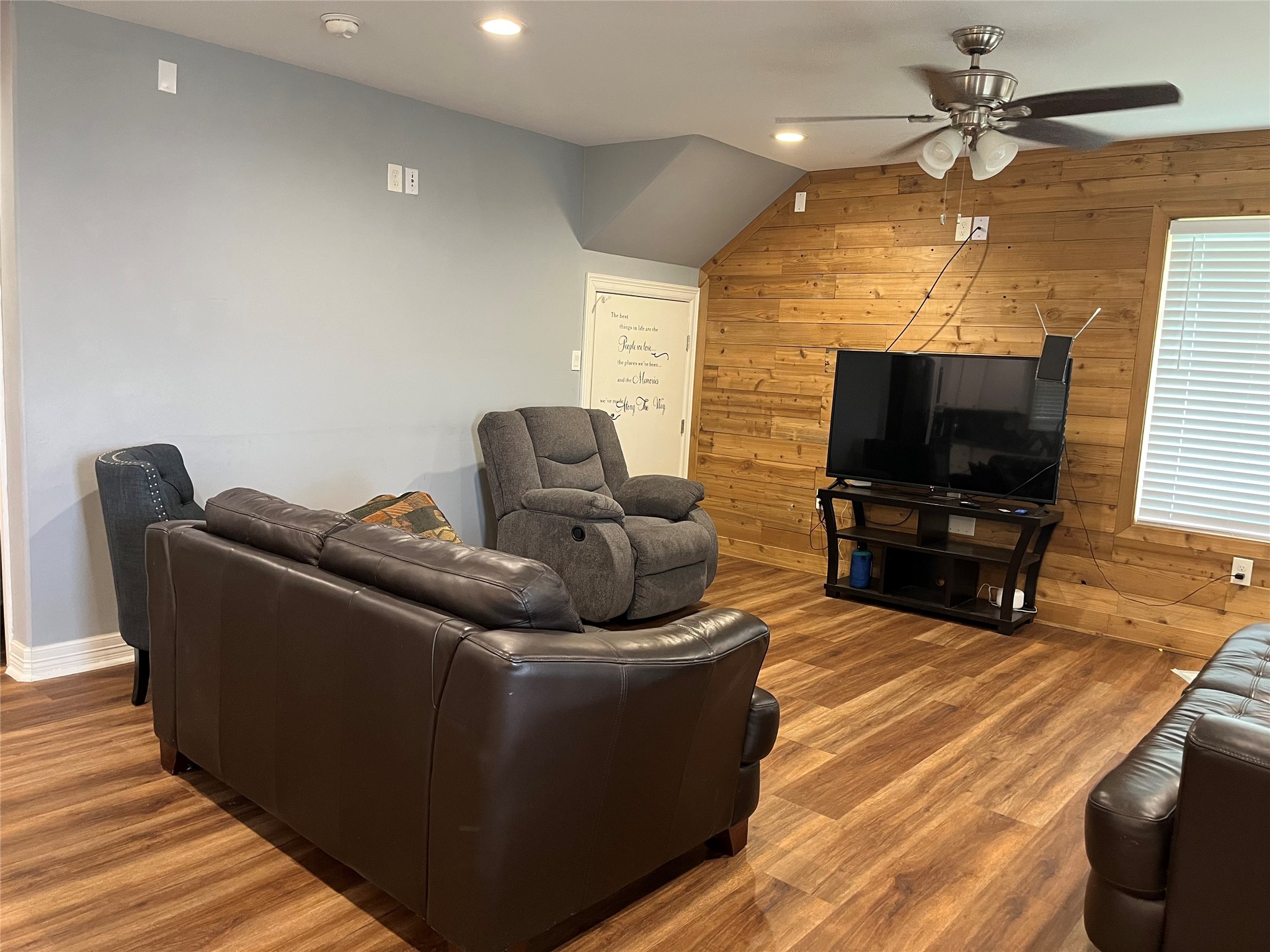 21511 Rio Villa Drive Houston, TX 77049 - Photo 33 of 45 a living room with furniture and a flat screen tv