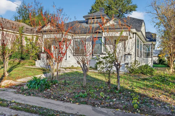 a view of a big yard next to a house