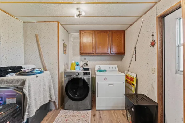 a utility room with dryer and washer