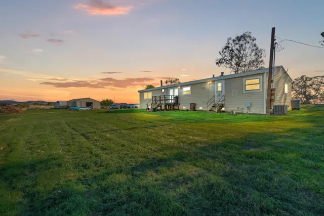 a view of a big room with an ocean view
