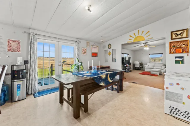 a room with furniture and a flat screen tv