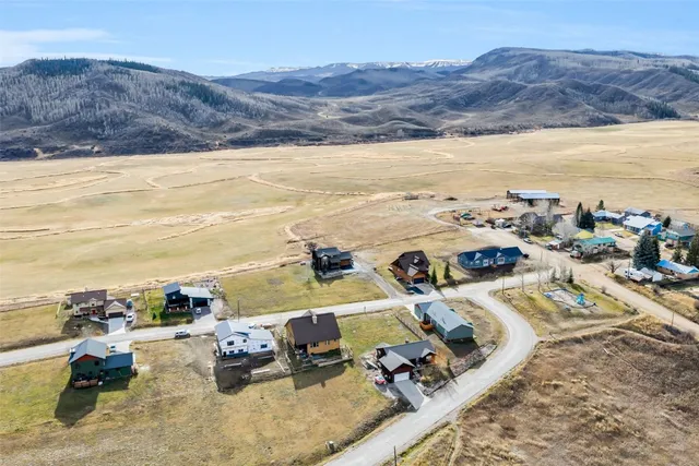 an aerial view of residential house with outdoor space