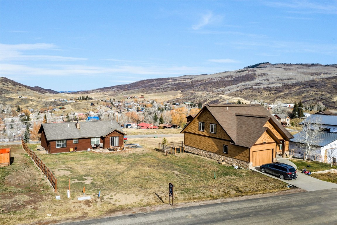 104 Oak Ridge Circle Oak Creek, CO 80467 - Photo 2 of 15 an aerial view of residential houses with outdoor space