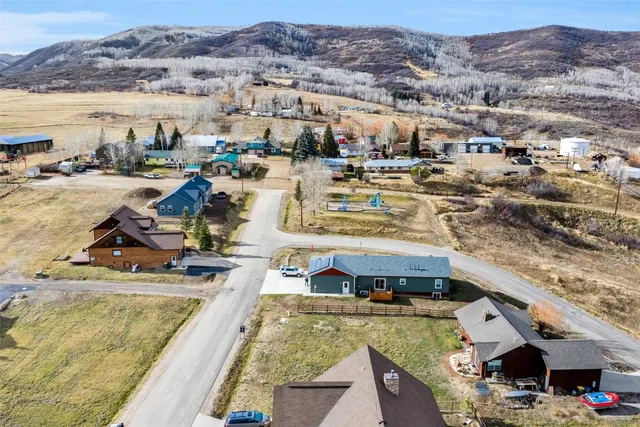 a view of a city with lawn chairs