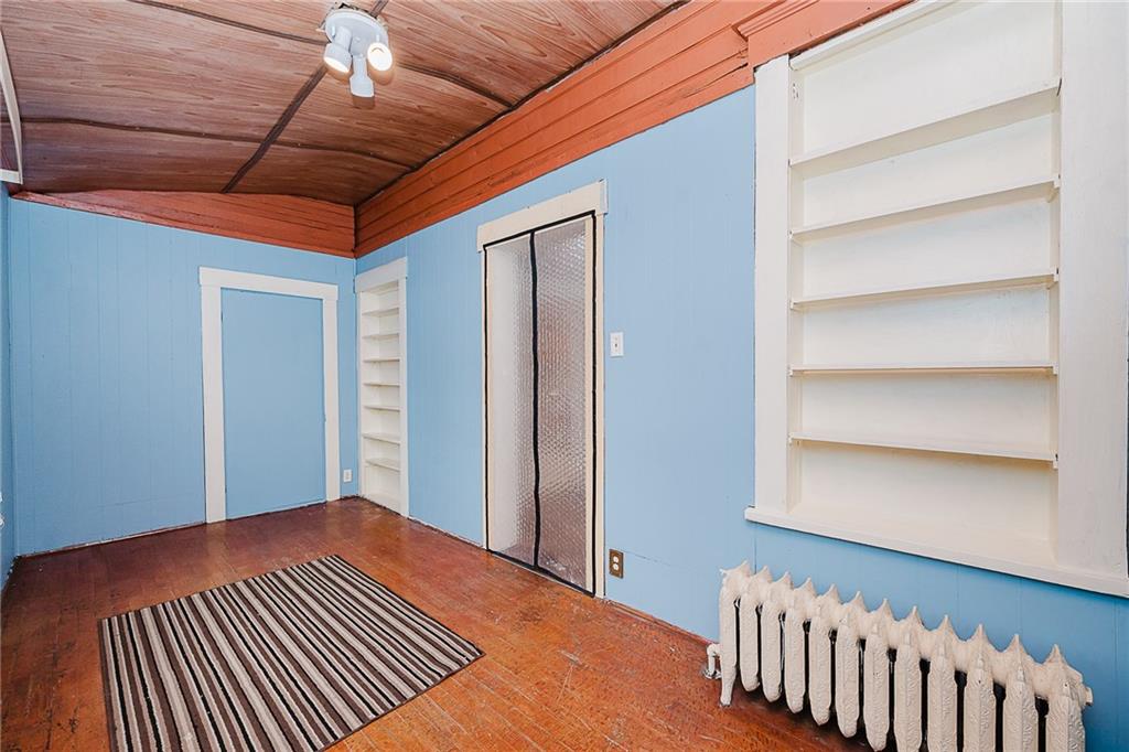 598 South 6th Street Indiana, PA 15701 - Photo 13 of 30 a view of a room with wooden floor and staircase
