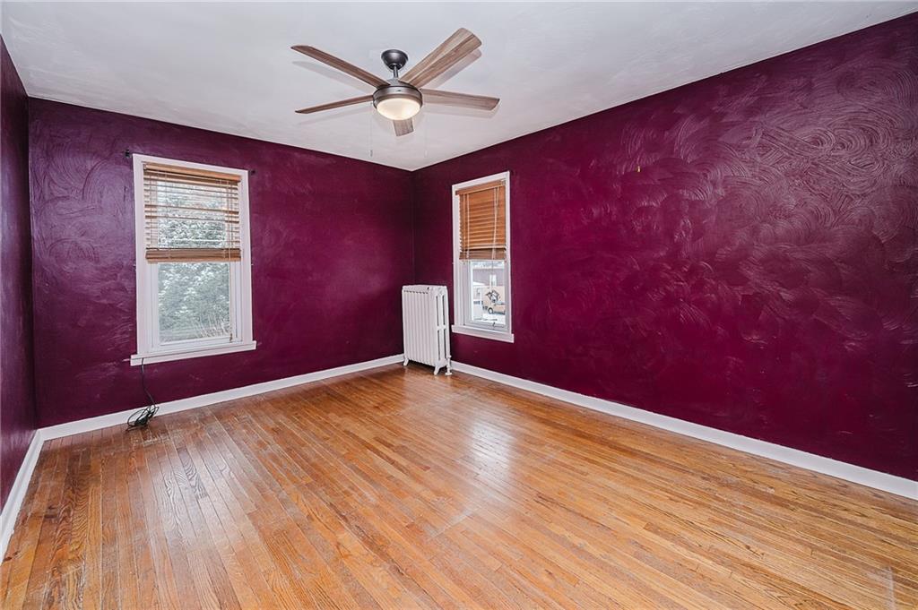 598 South 6th Street Indiana, PA 15701 - Photo 16 of 30 a view of empty room with wooden floor and fan