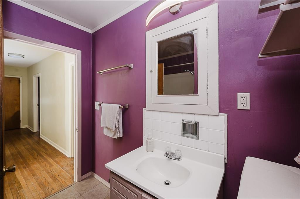 598 South 6th Street Indiana, PA 15701 - Photo 23 of 30 a bathroom with a sink a toilet and shower