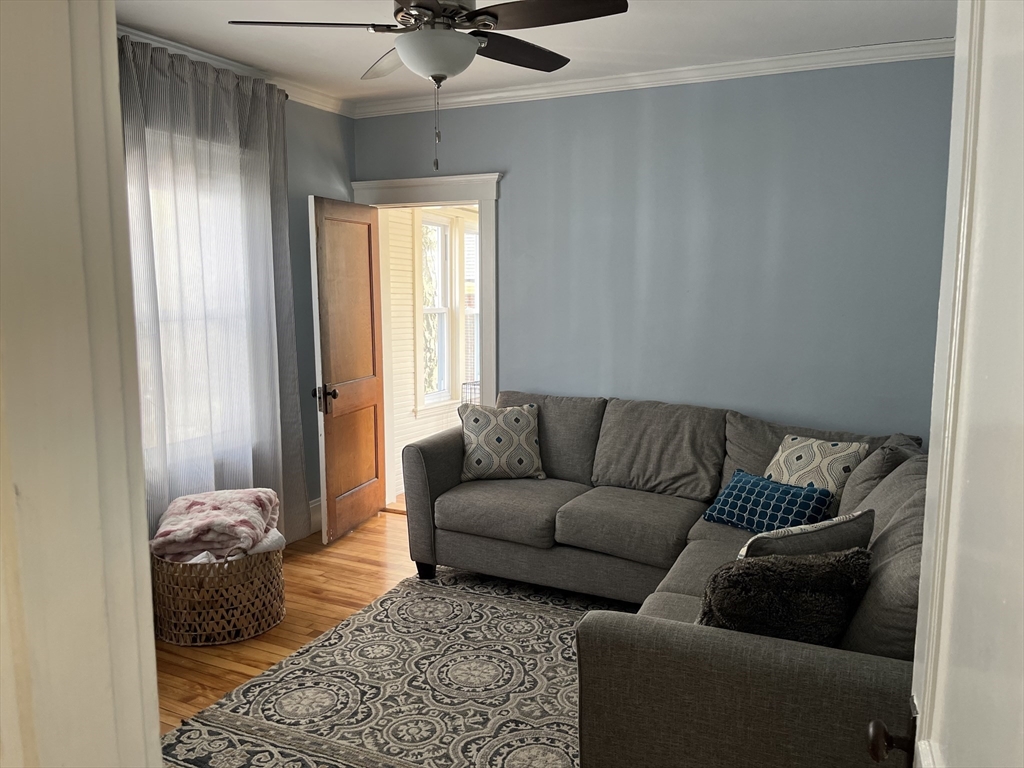 3 Chester Road, Unit 3 Belmont, MA 02478 - Photo 30 of 40 a living room with furniture and a window