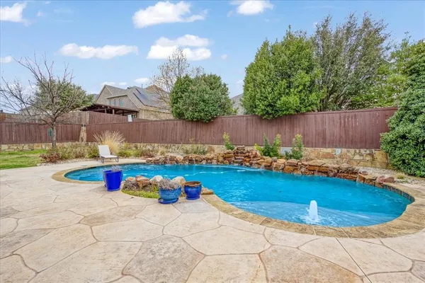 a view of outdoor space yard and swimming pool
