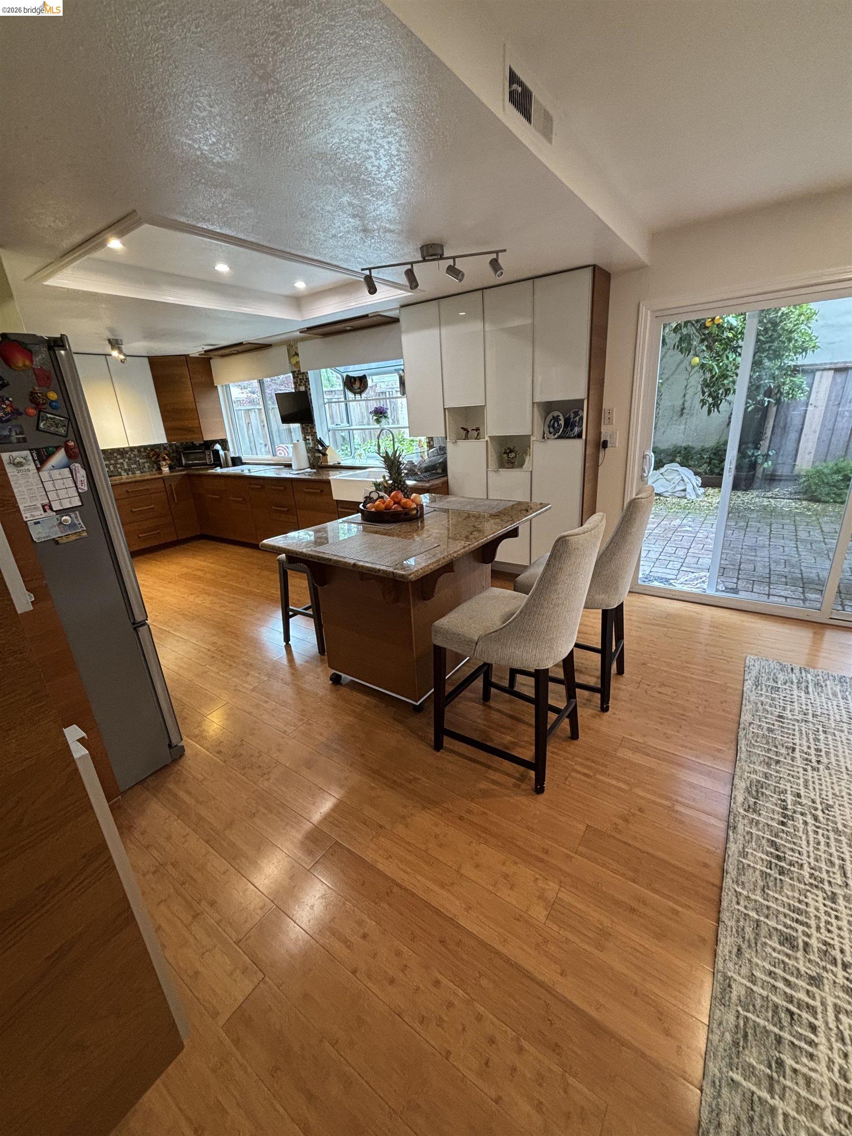 10013 Foxboro Circle San Ramon, CA 94583 - Photo 4 of 39 a living room with patio furniture and a floor to ceiling window
