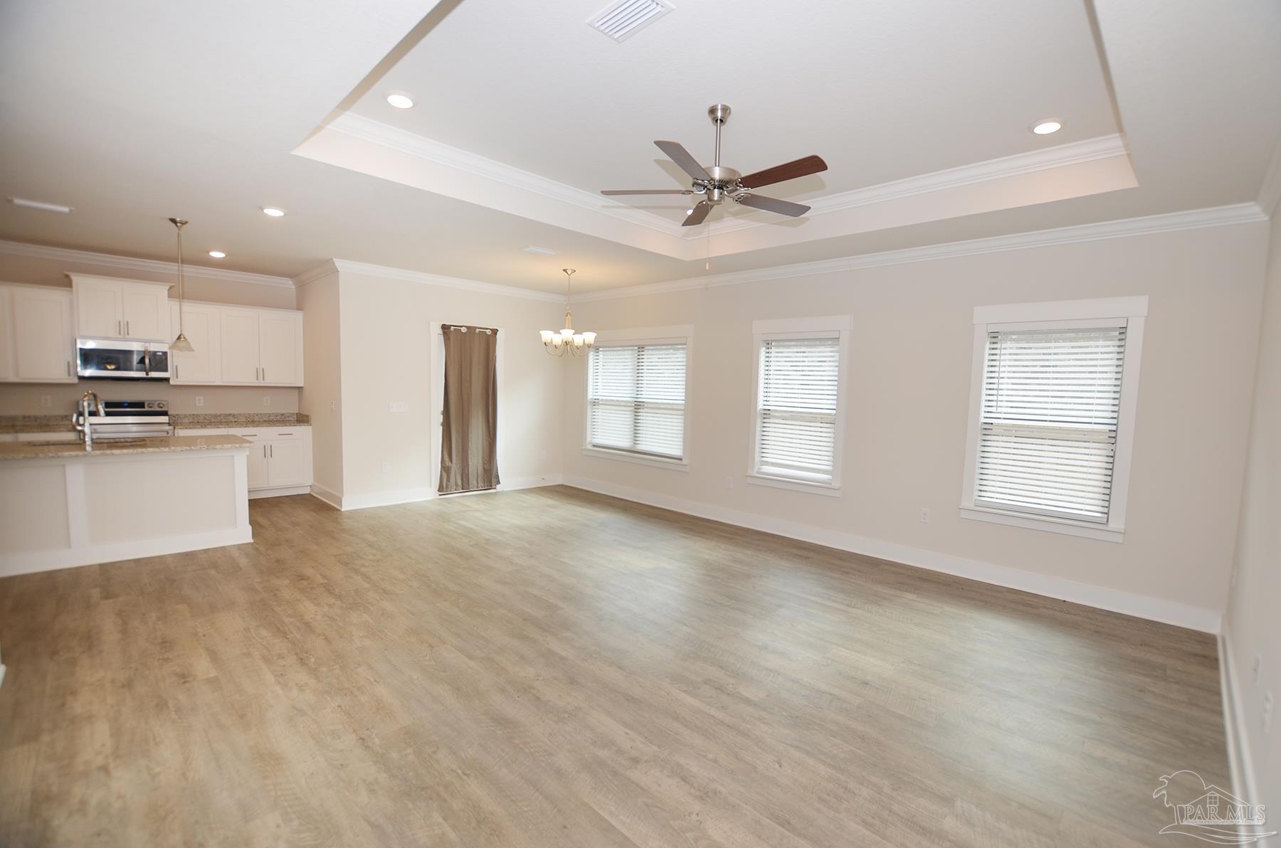 7420 Stagecoach Road Pensacola, FL 32526 - Photo 6 of 27 views toward the eat in area/ door to patio