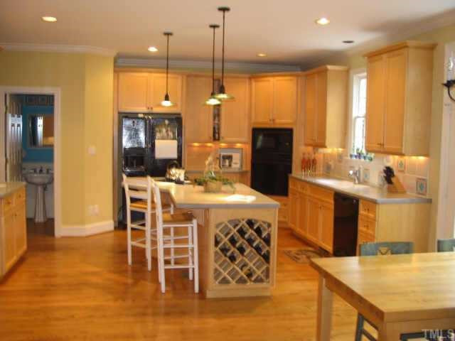 3124 Cranesbill Drive Raleigh, NC 27613 - Photo 2 of 12 Updated Kitchen w/ Black Appliances, Wet Bar, Secretary's Desk, Island, Solid Surface Countertops & More! Other