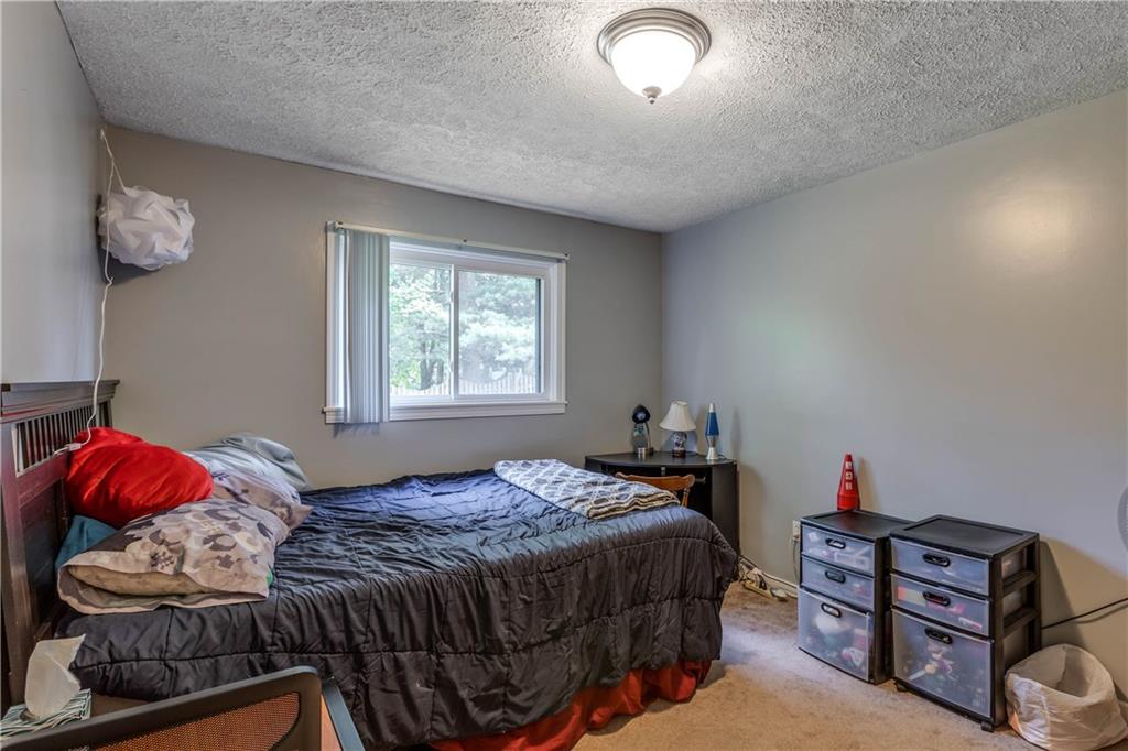 1664 Brodhead Road Coraopolis, PA 15108 - Photo 20 of 25 Bedroom on the main floor. Back of home.
