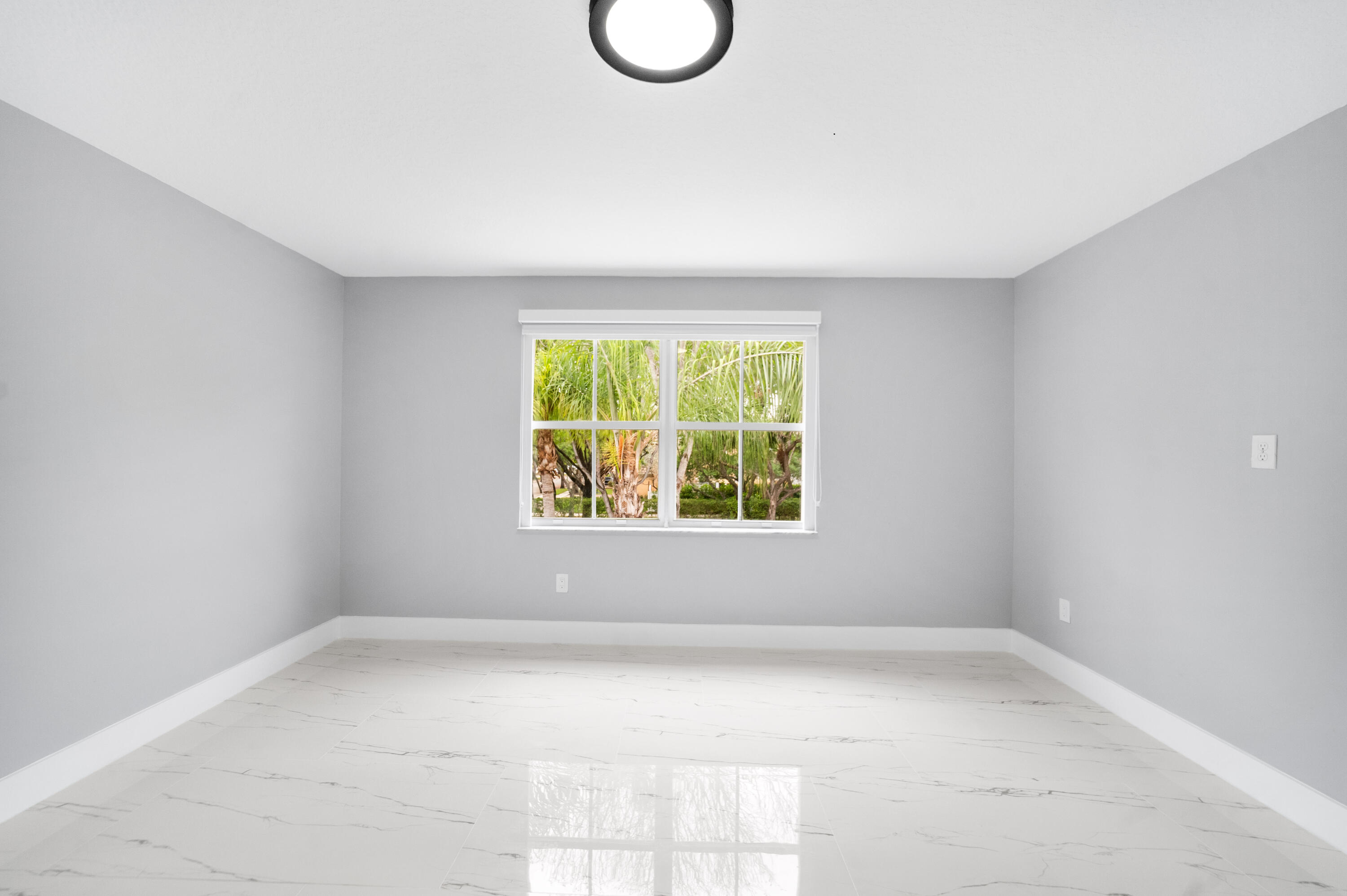 5233 Southwest 155th Way Miramar, FL 33027 - Photo 21 of 63 an empty room with a window