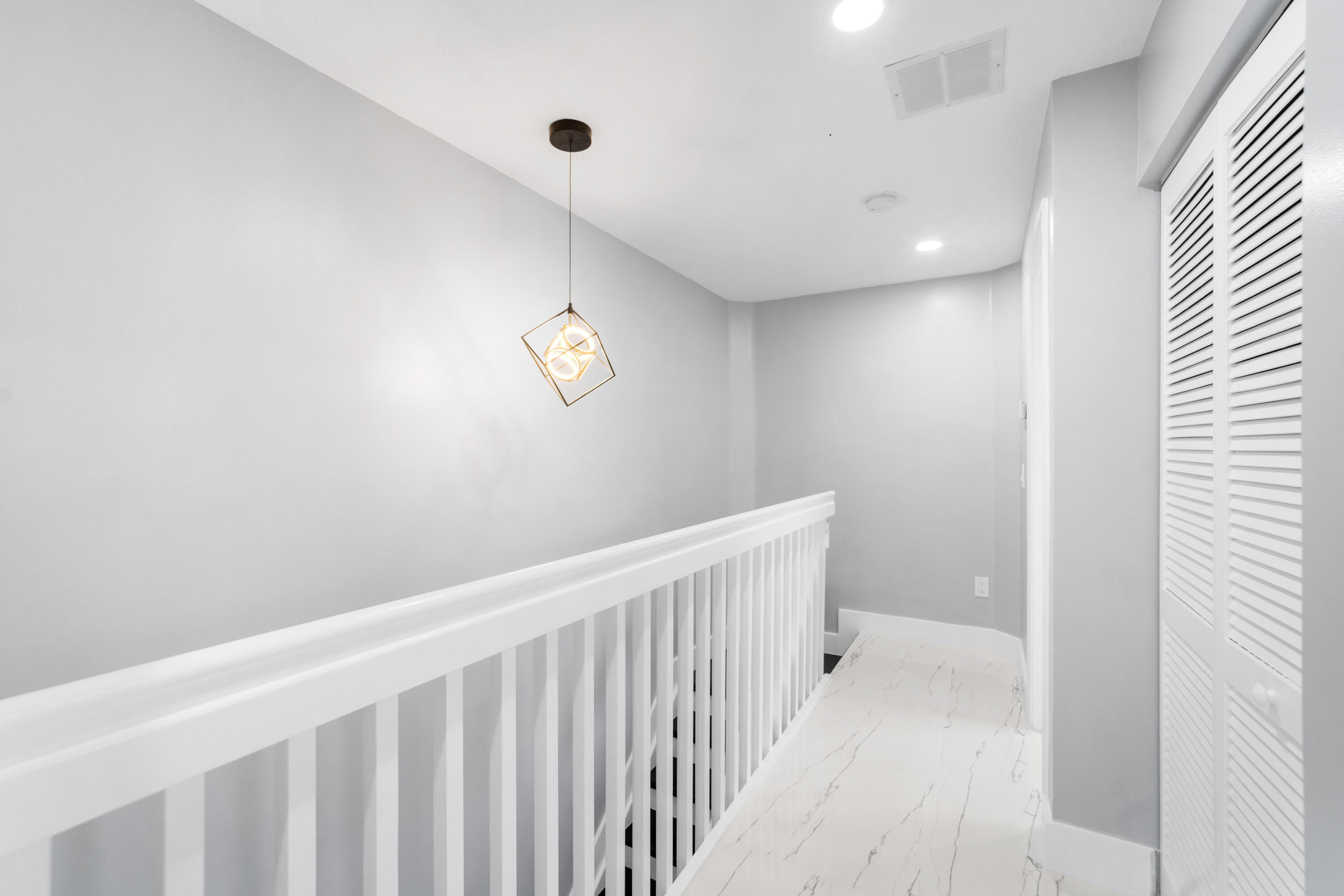 5233 Southwest 155th Way Miramar, FL 33027 - Photo 26 of 63 a view of a hallway with a window