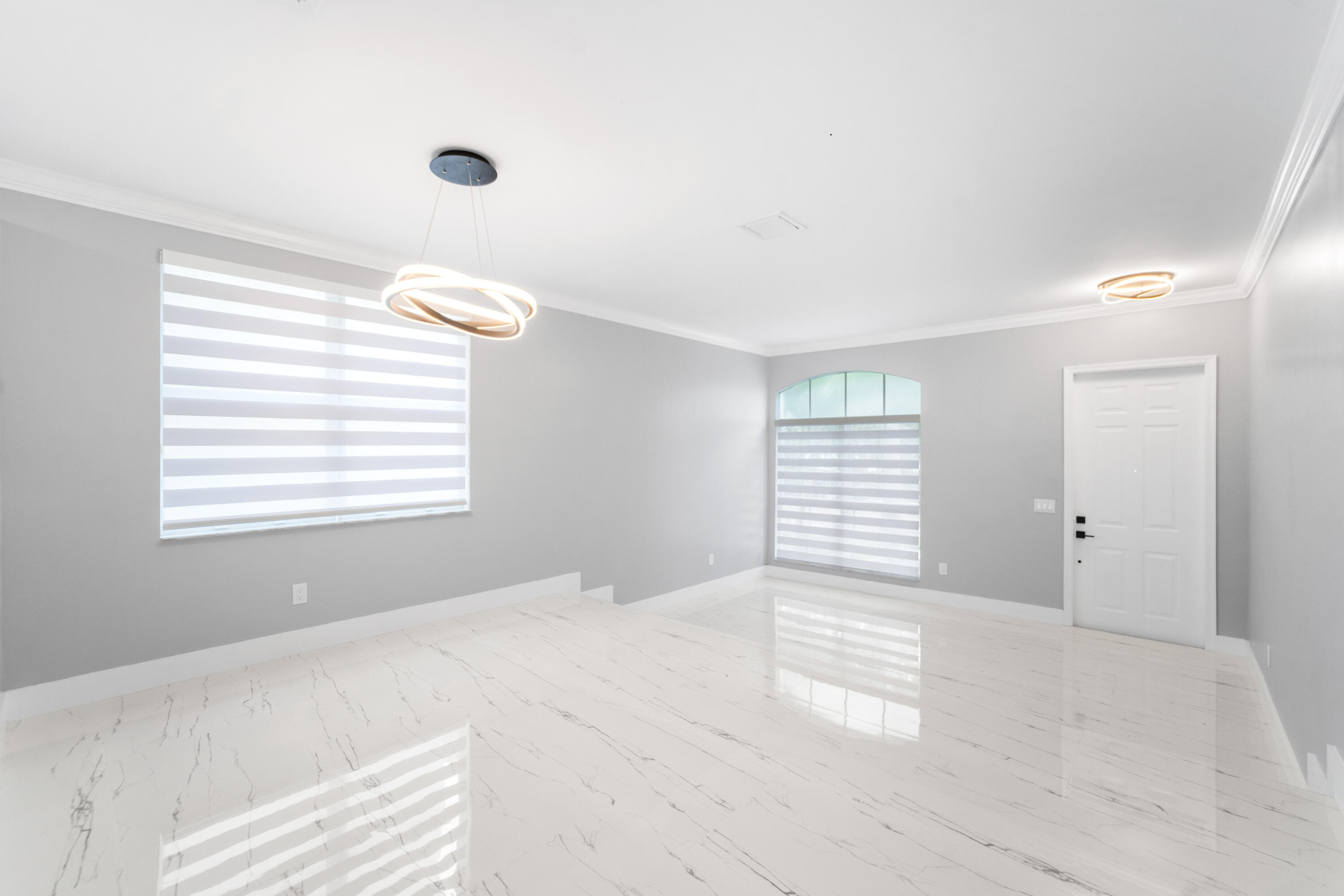 5233 Southwest 155th Way Miramar, FL 33027 - Photo 3 of 63 a view of an empty room with a window