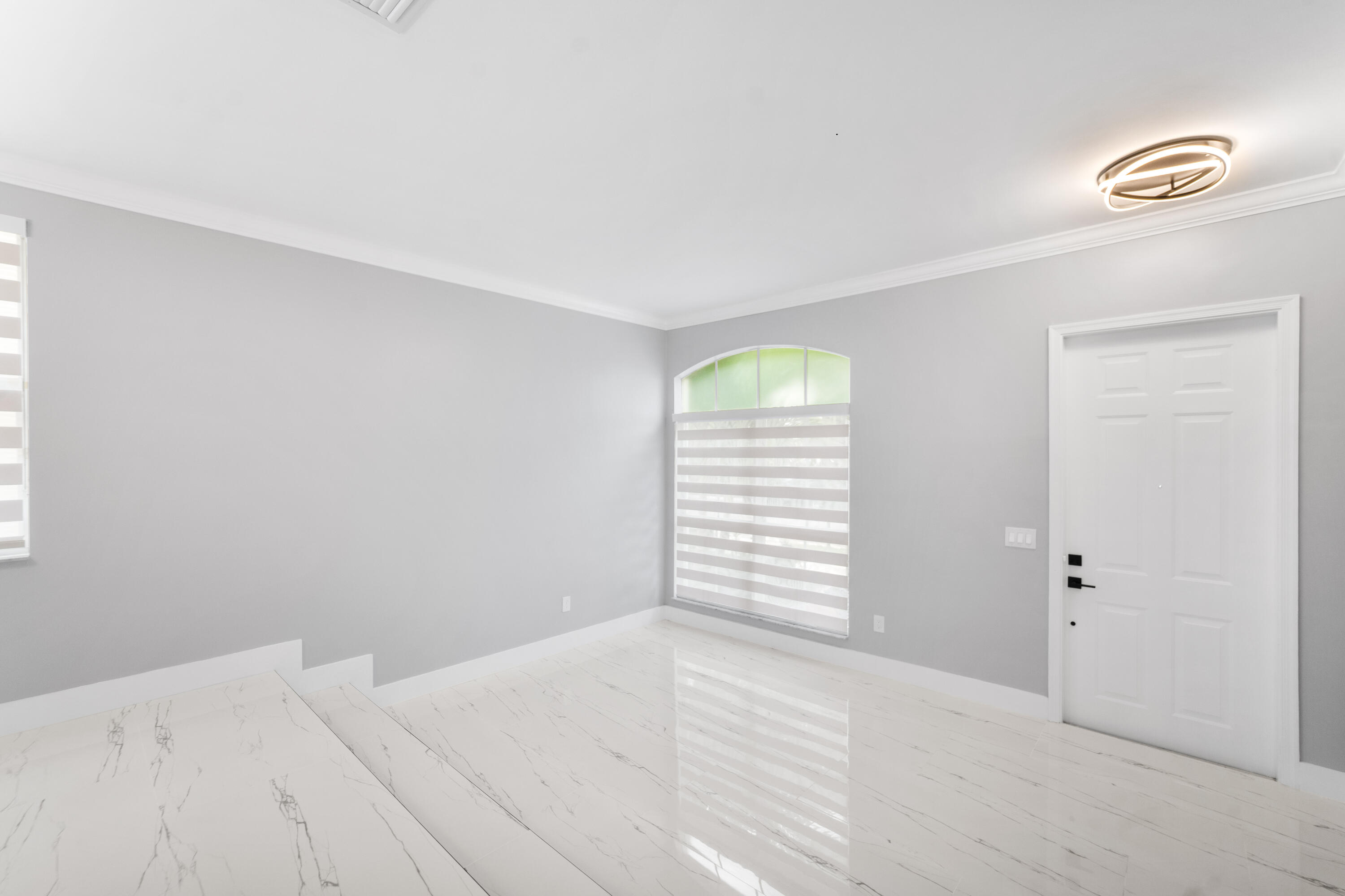 5233 Southwest 155th Way Miramar, FL 33027 - Photo 40 of 63 an empty room with windows and closet
