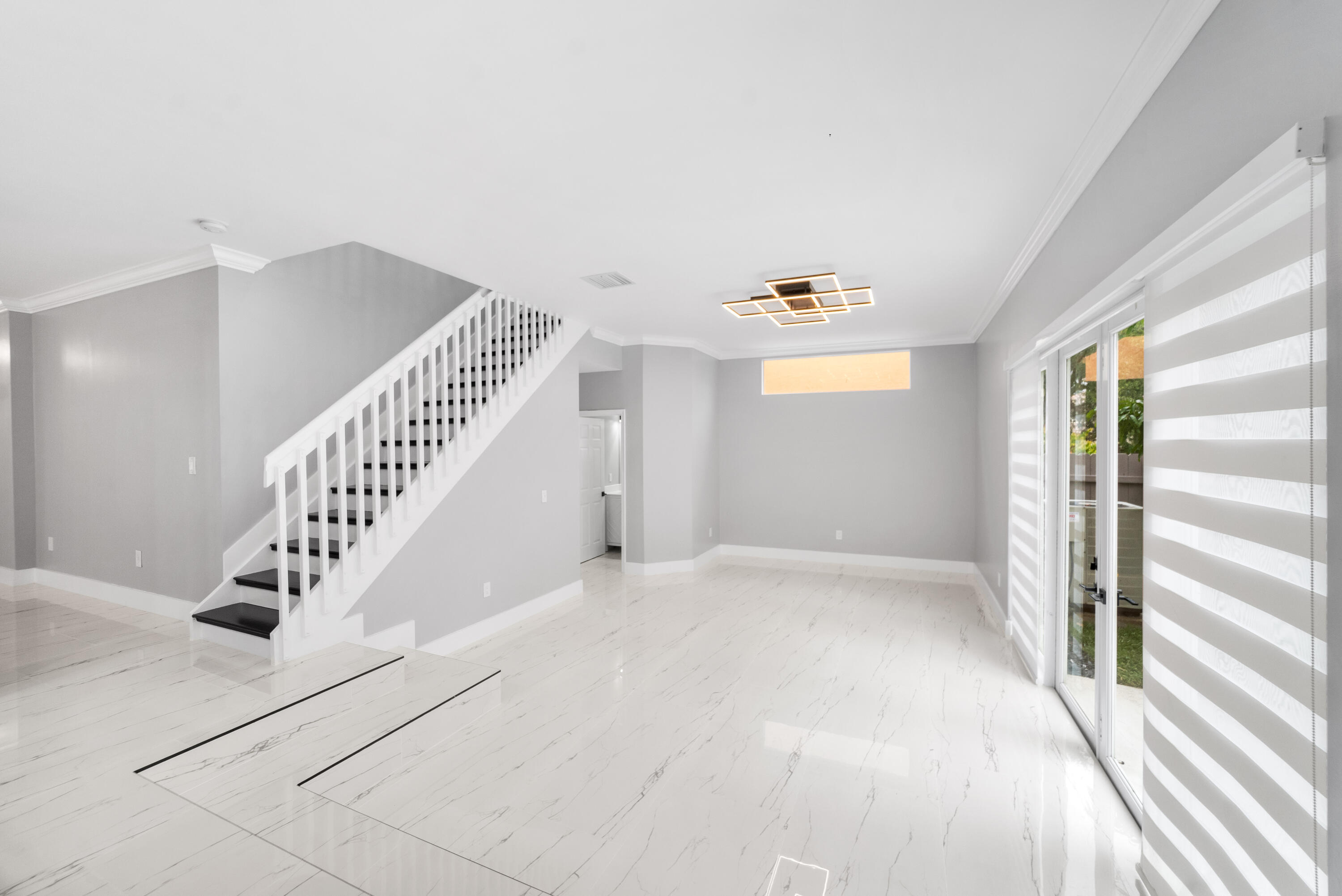 5233 Southwest 155th Way Miramar, FL 33027 - Photo 44 of 63 a view of an entryway with wooden floor
