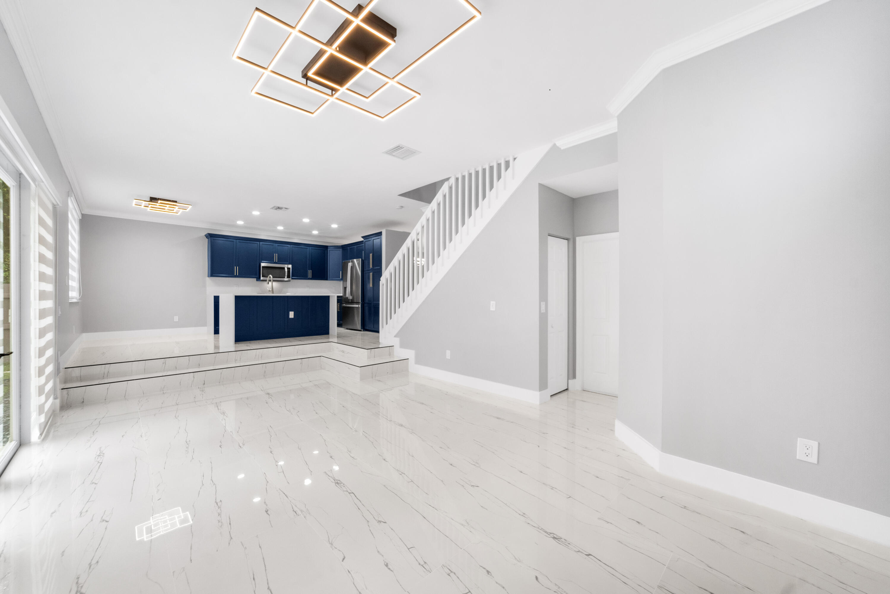 5233 Southwest 155th Way Miramar, FL 33027 - Photo 46 of 63 a view of empty room with stairs and wooden floor