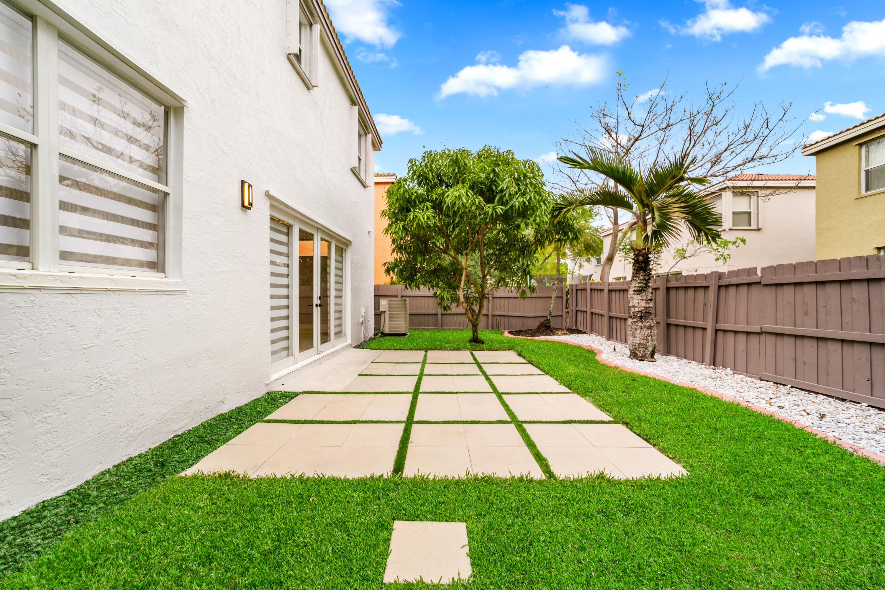 5233 Southwest 155th Way Miramar, FL 33027 - Photo 48 of 63 a view of a backyard with plants