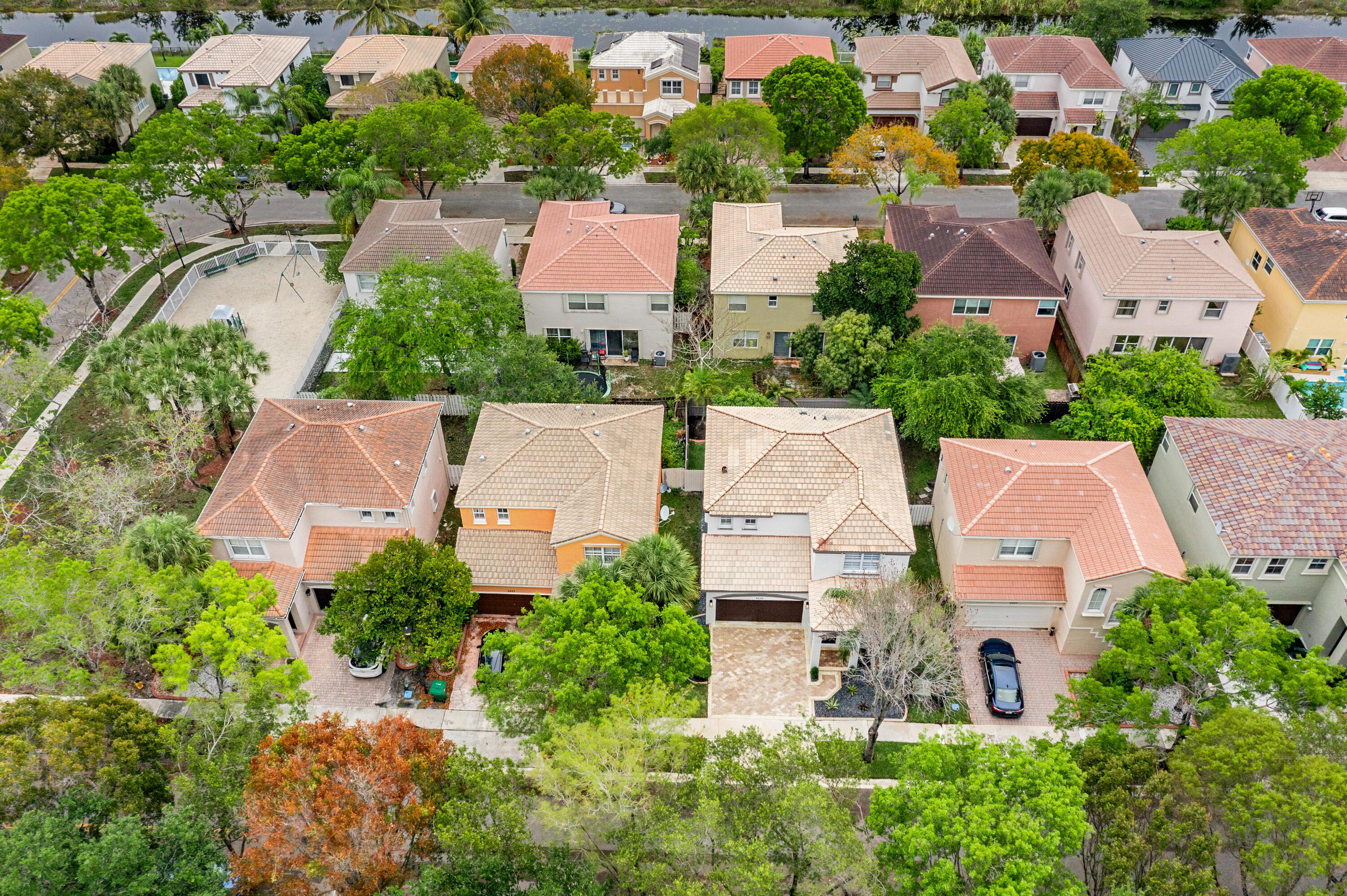 5233 Southwest 155th Way Miramar, FL 33027 - Photo 55 of 63 an aerial view of a house with a yard and lake view