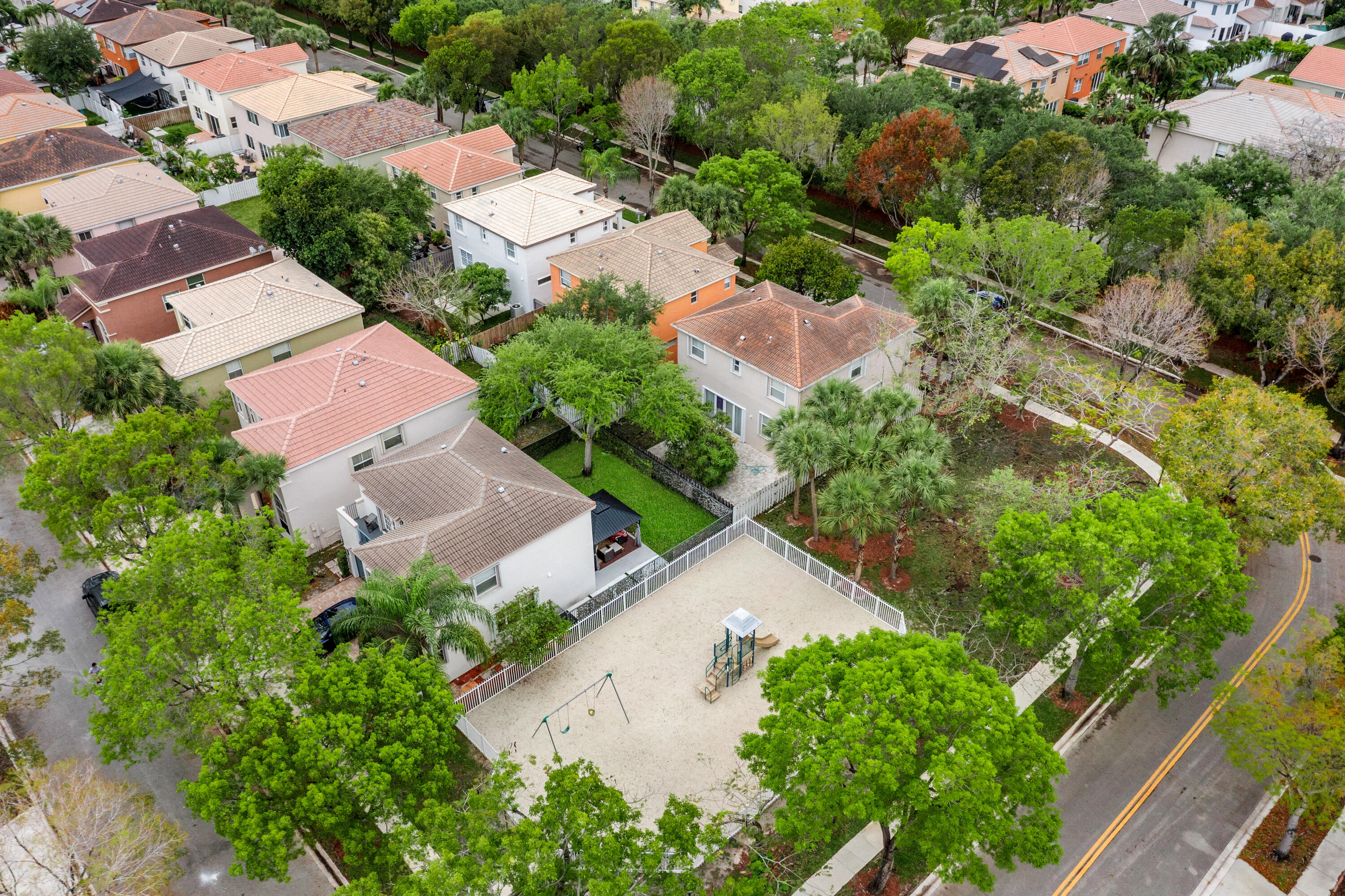 5233 Southwest 155th Way Miramar, FL 33027 - Photo 58 of 63 an aerial view of residential houses with outdoor space