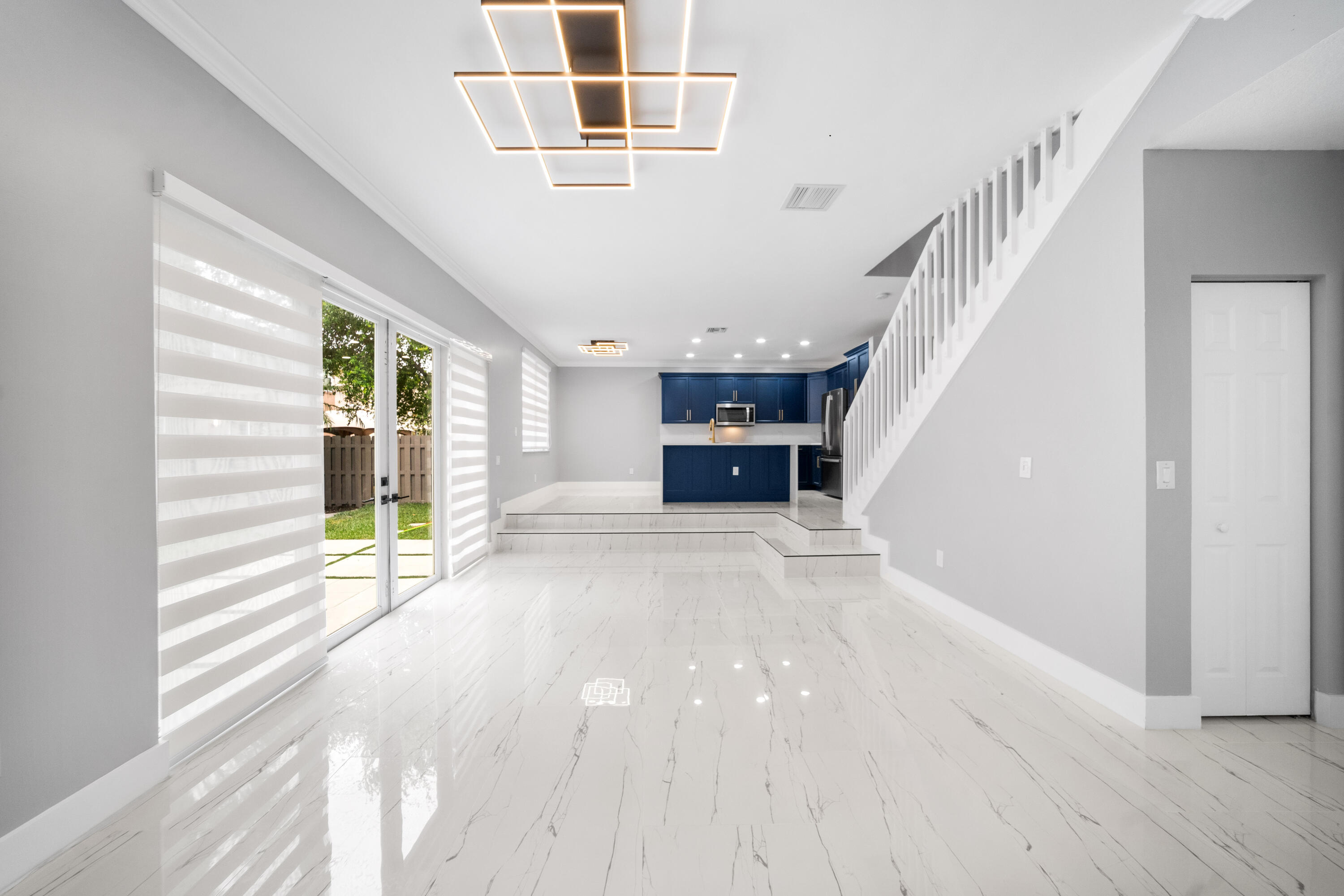 5233 Southwest 155th Way Miramar, FL 33027 - Photo 7 of 63 a view of empty room with wooden floor and fan