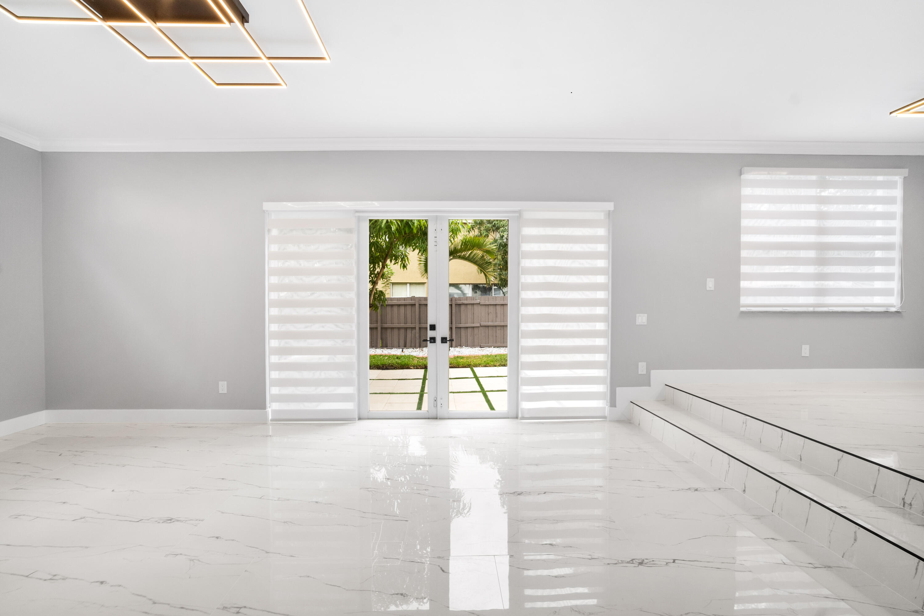 5233 Southwest 155th Way Miramar, FL 33027 - Photo 8 of 63 a view of an empty room with a window