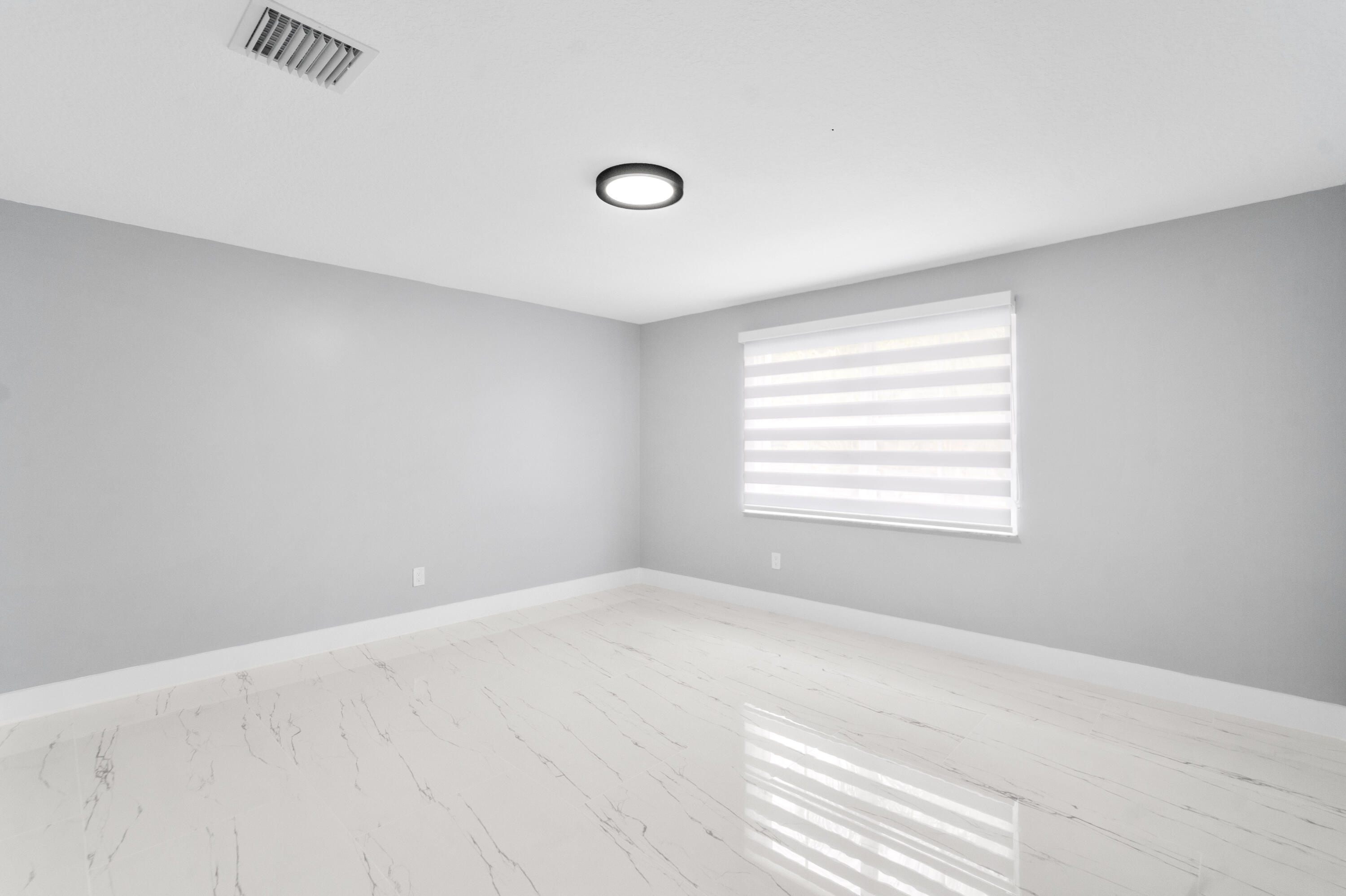 5233 Southwest 155th Way Miramar, FL 33027 - Photo 10 of 63 a view of a window in a room
