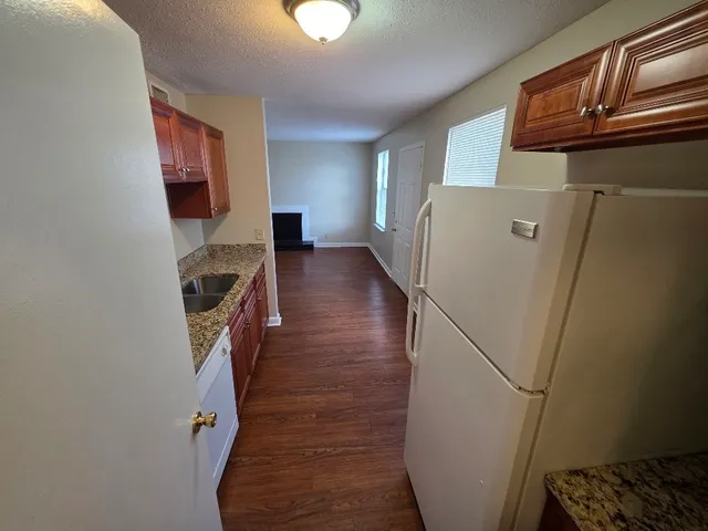 a view of livingroom with furniture and wooden floor