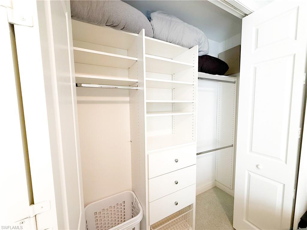 516 Eagle Creek Drive Naples, FL 34113 - Photo 21 of 28 a view of a walk in closet
