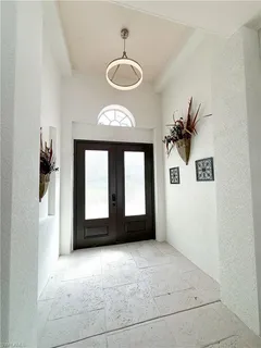 $569,000 | 516 Eagle Creek Drive, Naples, FL 34113