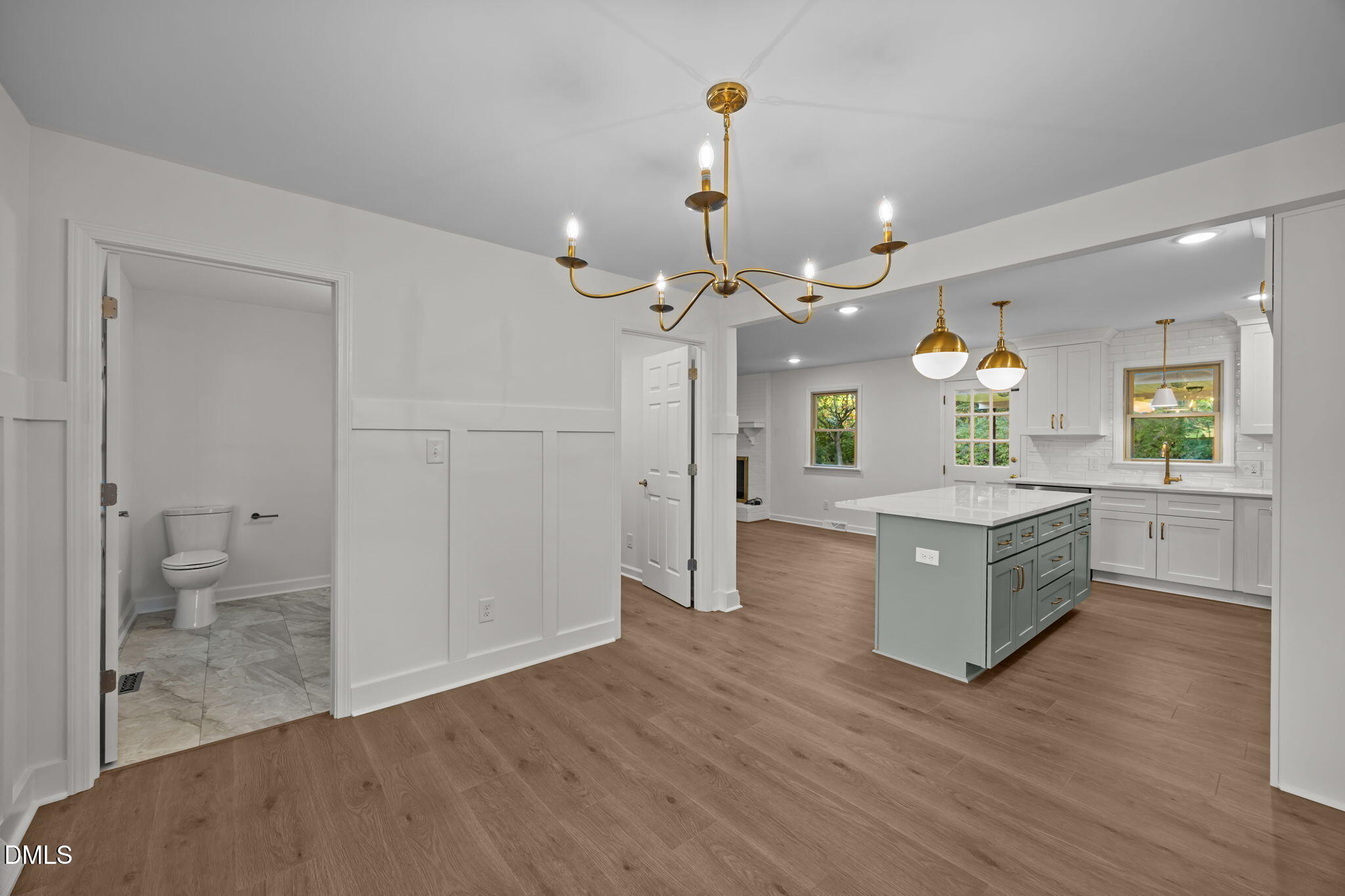 102 Royall Road Oxford, NC 27565 - Photo 18 of 53 a large kitchen with a counter space a sink stainless steel appliances and cabinets
